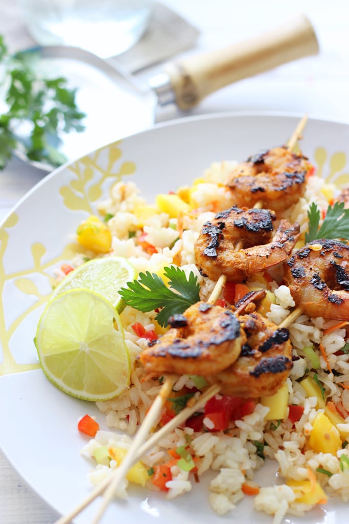 A fresh and delicious tropical mango salad with grilled curry shrimp. Use rice, quinoa, couscous, cauliflower rice or just about any grains!
