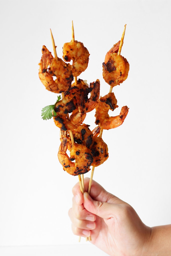 A fresh and delicious tropical mango salad with grilled curry shrimp. Use rice, quinoa, couscous, cauliflower rice or just about any grains!