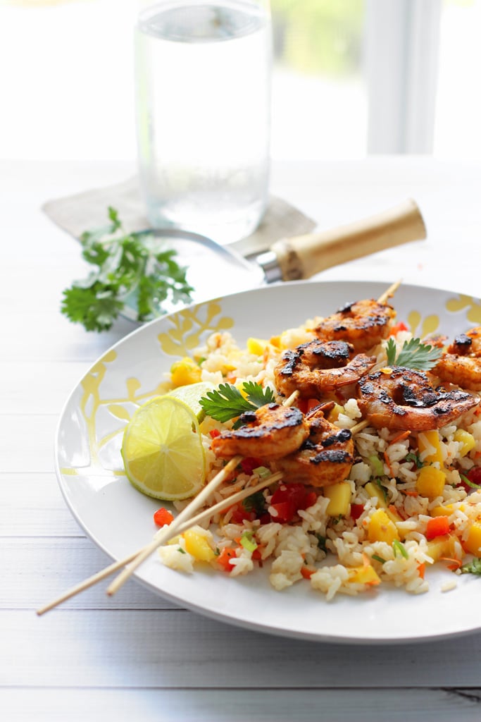 A fresh and delicious tropical mango salad with grilled curry shrimp. Use rice, quinoa, couscous, cauliflower rice or just about any grains!