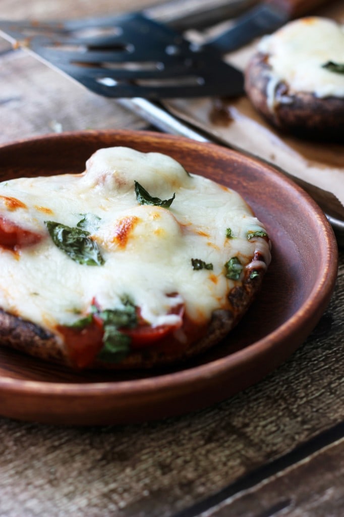 Portobello mushroom caps stuffed with marinara sauce, grape tomatoes, mozzarella and fresh basil.