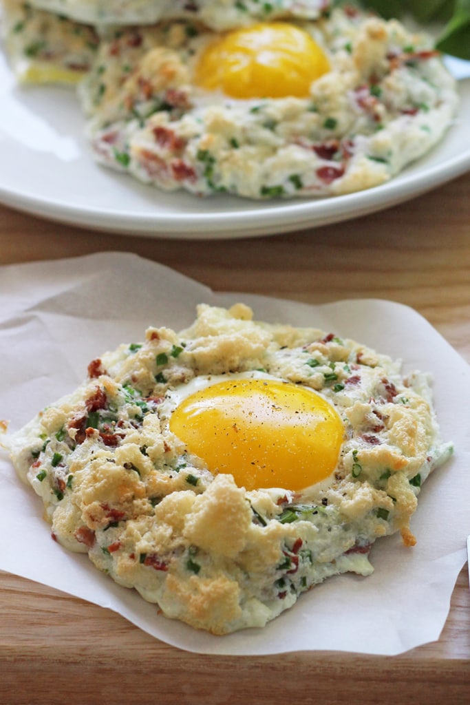Eggs in clouds make a great, low calorie breakfast with fluffy egg whites baked with crumbled bacon, chives and Parmesan cheese and a nestled egg yolk.