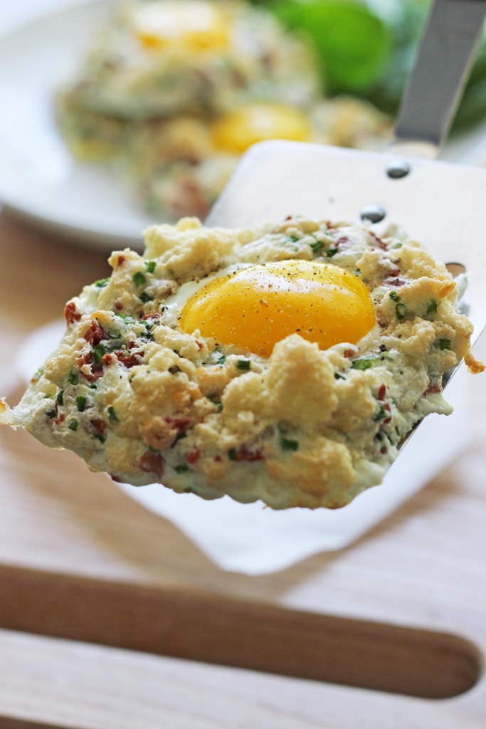 Eggs in clouds make a great, low calorie breakfast with fluffy egg whites baked with crumbled bacon, chives and Parmesan cheese and a nestled egg yolk.