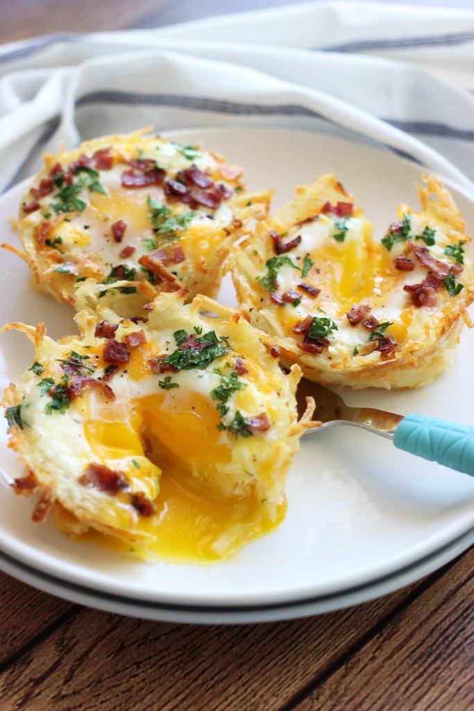 Shredded hash browns and cheese nests baked until crispy topped with a baked eggs, crumbled bacon and more cheese. Served with chilled avocado slices.