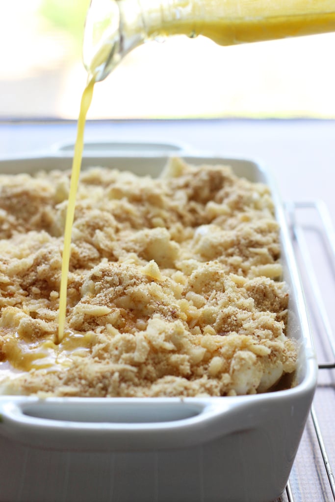 A cheesy, creamy cauliflower Au Gratin casserole with rich Bechamel sauce topped with a crusty layer of breadcrumbs and cheese.