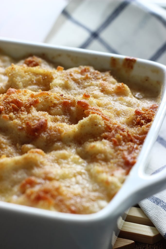 A cheesy, creamy cauliflower Au Gratin casserole with rich Bechamel sauce topped with a crusty layer of breadcrumbs and cheese.