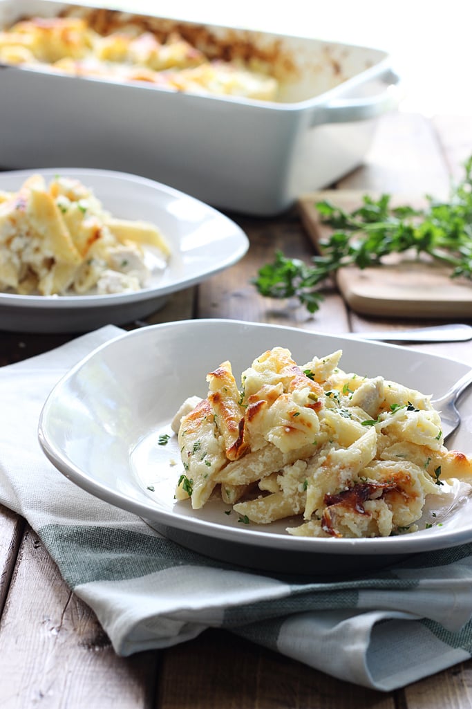 Creamy, cheesy packed chicken Alfredo pasta bake with three kinds of cheese and plenty to go around. Lots of gooey, stringy cheese in this fall casserole!