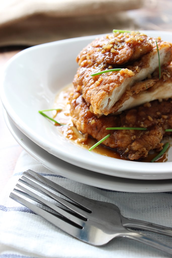 Crispy honey garlic chicken is a fast fix for dinner for two with a double battered spice mix served with honey garlic sauce.