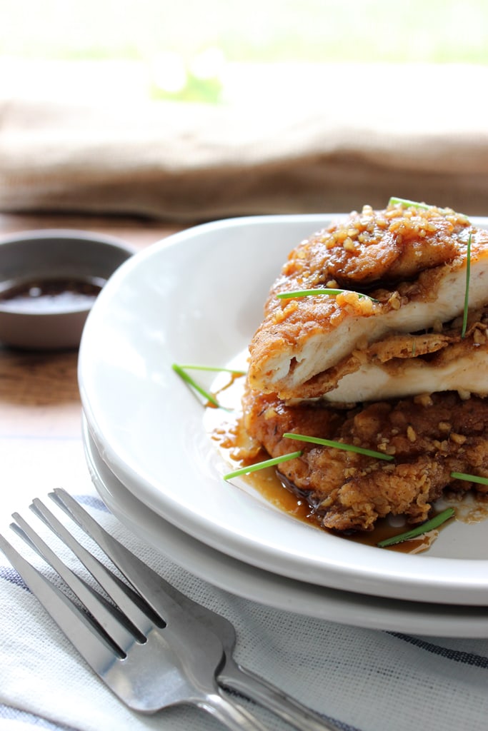 Crispy honey garlic chicken is a fast fix for dinner for two with a double battered spice mix served with honey garlic sauce.