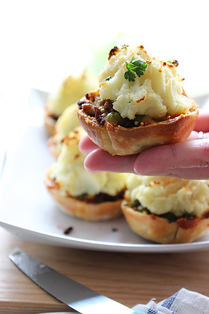 These mini Shepherd's pot pies are a cute and insanely delicious spin on the classic Shepherd's pie with all the goodness of a  flaky, crumbly pie crust.