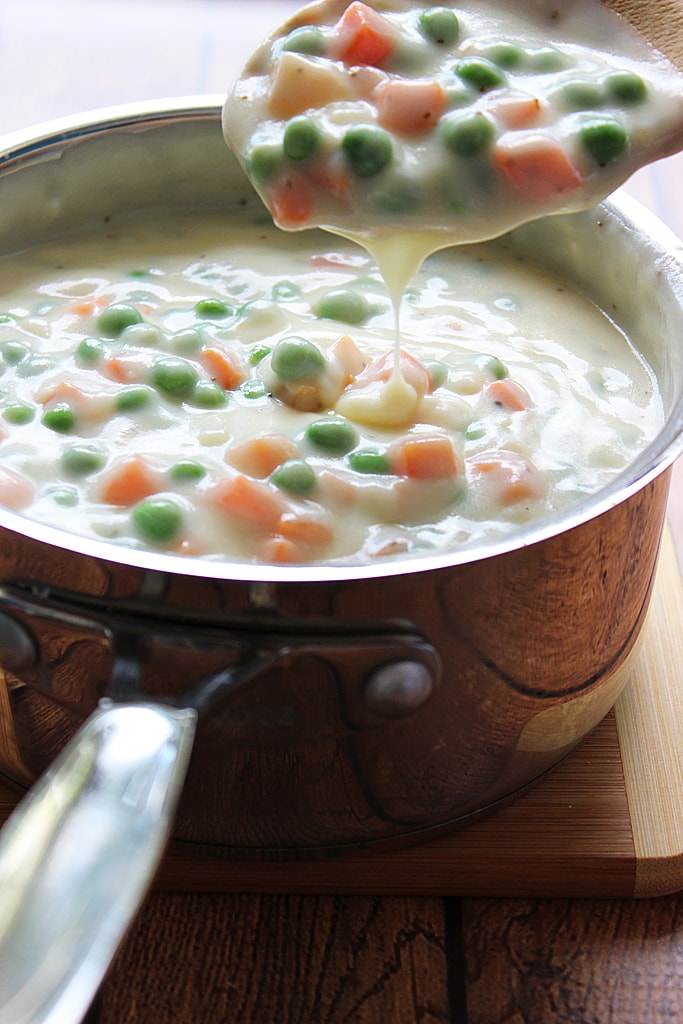 This recipe for skillet chicken pot pie uses one pre-made pie crust as a healthier way to enjoy this classic comfort food.