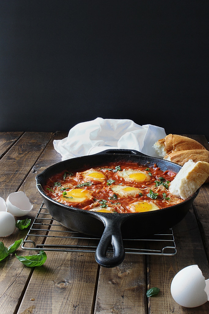 Eggs in Hell are a quick and spicy way to enjoy your eggs in the morning. With plenty of spices, Parmesan cheese and eggs simmered in tomato sauce.