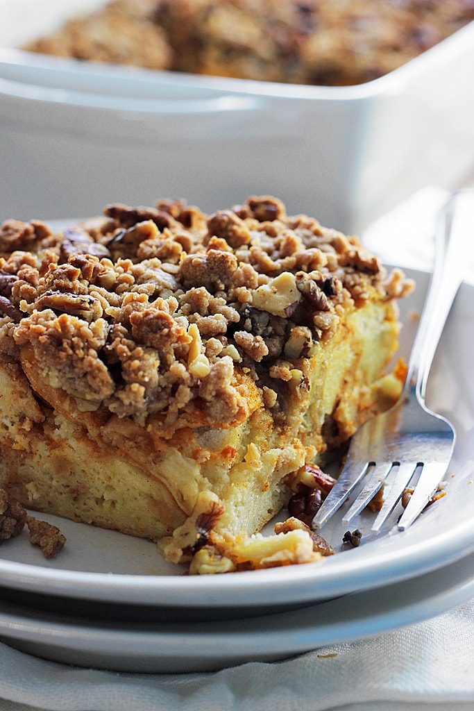 Pumpkin spice french toast casserole is a great fall brunch or dessert loaded with pumpkin and pumpkin pie flavors and a sweet and nutty streusel.