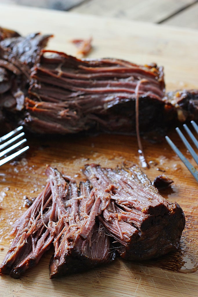 Slow cooker balsamic roast only needs 15 minutes of preparation. Brown sugar balances out the balsamic vinegar to create a mildly sweet and savory roast.
