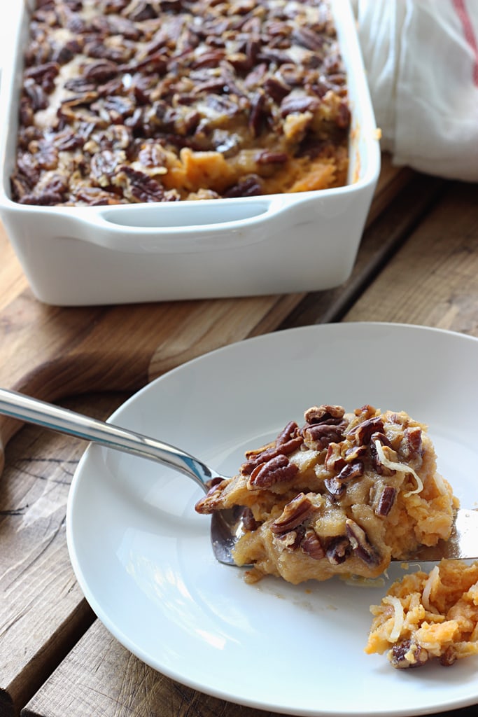 Sweet potato casserole is delicious and comforting, sweet but not too decadent.  With a crunchy fudge topping and festive sweet potato and coconut filling.