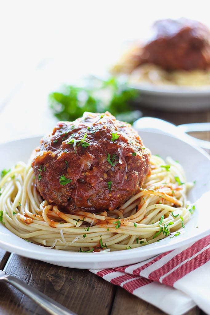 Mozzarella stuffed meatball pasta for two. At half a pound each, one meatball is all you need! Complete with a gooey cheesy center.