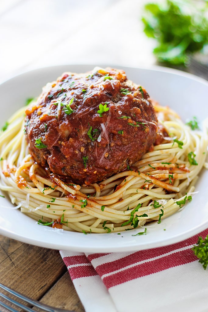 Mozzarella stuffed meatball pasta for two. At half a pound each, one meatball is all you need! Complete with a gooey cheesy center.