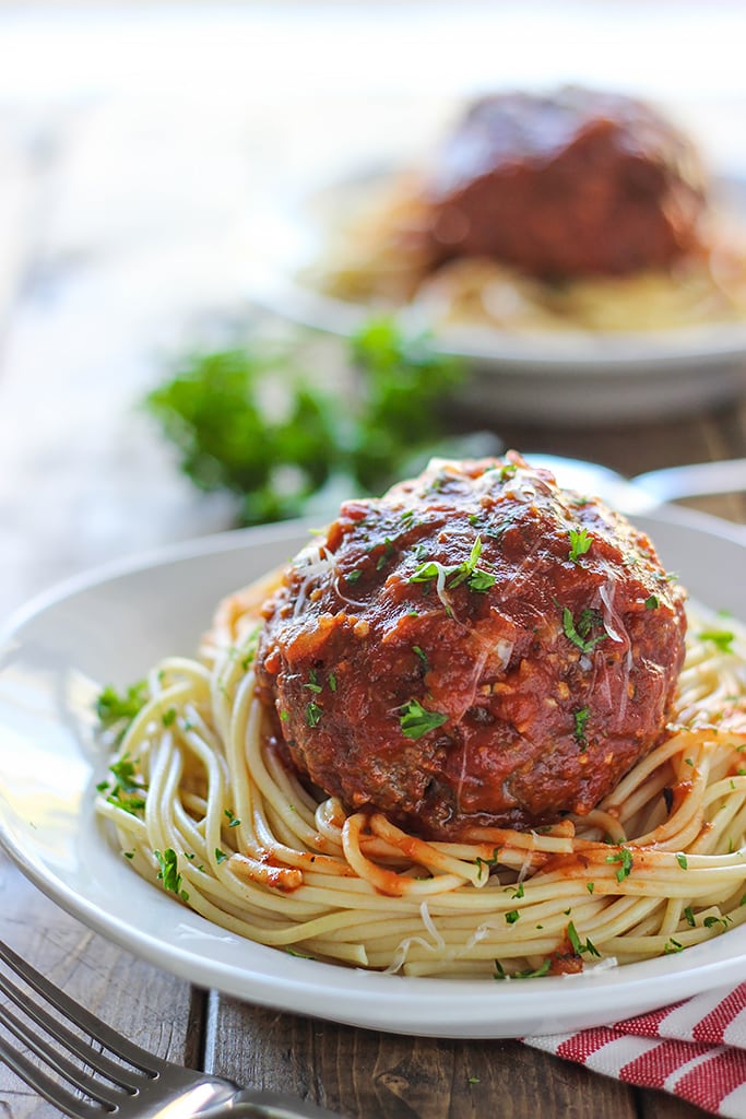 Mozzarella stuffed meatball pasta for two. At half a pound each, one meatball is all you need! Complete with a gooey cheesy center.