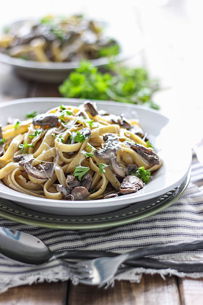 Hearty, earthy and meaty. This creamy mushroom Alfredo is a great dinner for two for pasta lovers.