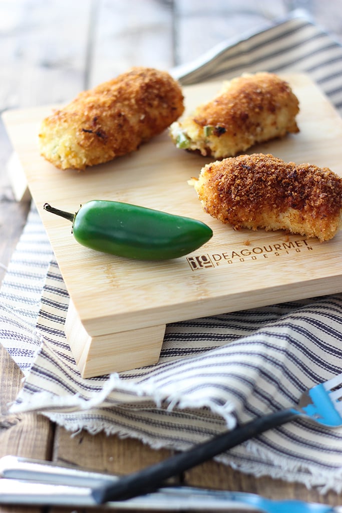 Jalapeno popper chicken is a fun way to snack with cream cheese, bacon bits and jalapenos stuffing in a crispy breaded chicken!