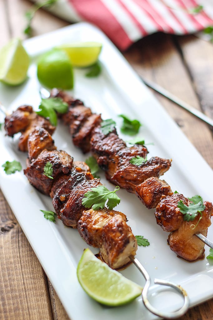 A savory and sweet marinade and baste makes these easy honey garlic chicken skewers perfect for cookouts!