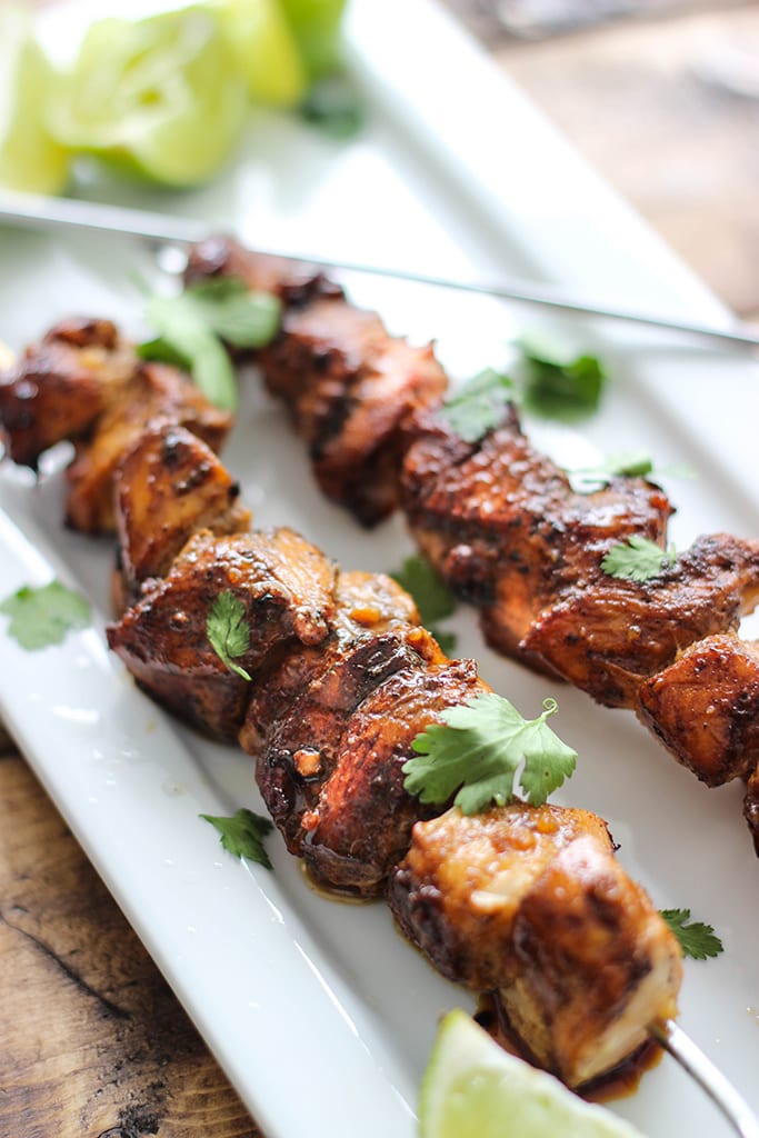 A savory and sweet marinade and baste makes these easy honey garlic chicken skewers perfect for cookouts!