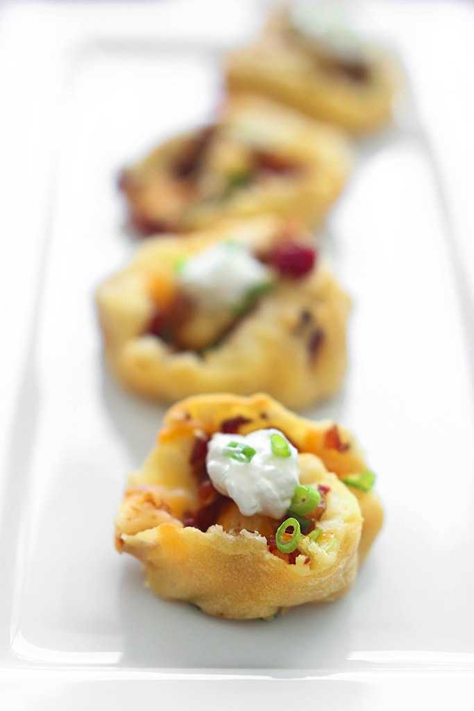 Make a great appetizer with these loaded potato pinwheels. Made form frozen crescent rolls, leftover mashed potatoes, bacon bits and cheese!