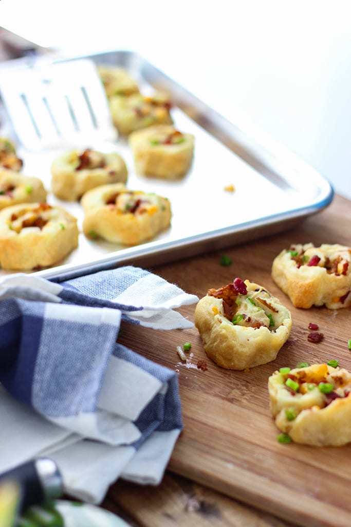 Make a great appetizer with these loaded potato pinwheels. Made form frozen crescent rolls, leftover mashed potatoes, bacon bits and cheese!