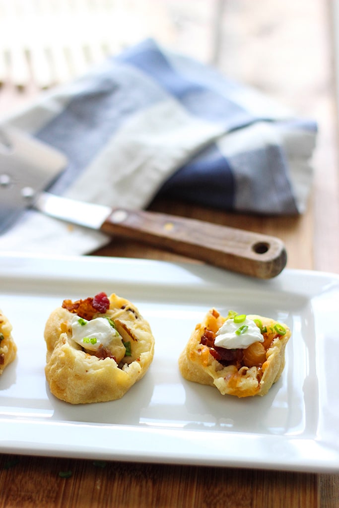 Make a great appetizer with these loaded potato pinwheels. Made form frozen crescent rolls, leftover mashed potatoes, bacon bits and cheese!