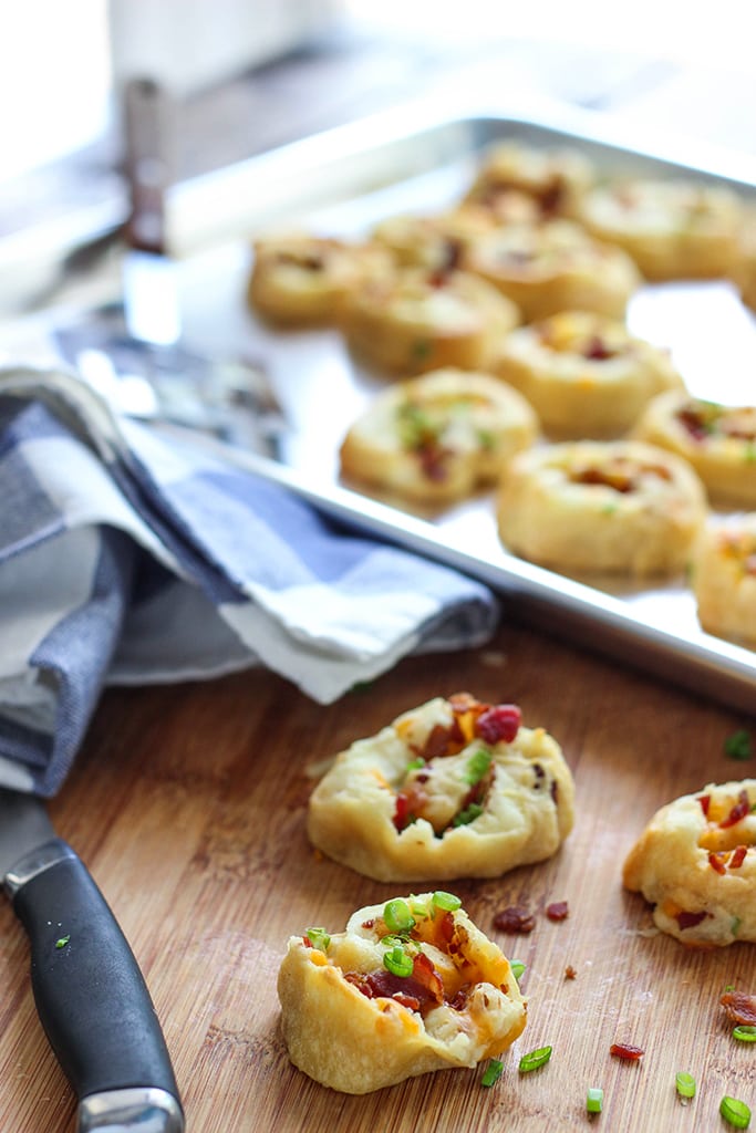 Make a great appetizer with these loaded potato pinwheels. Made form frozen crescent rolls, leftover mashed potatoes, bacon bits and cheese!