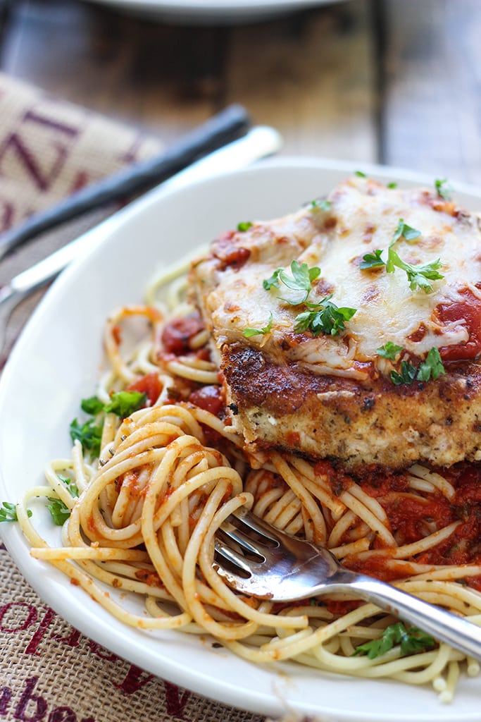 This skillet chicken Parmesan is ready under 30 minutes. With Parmesan herbed breading served with mozzarella cheese and marinara sauce.