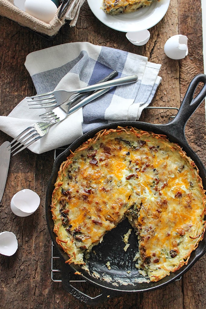 Enjoy a crispy hash brown crust in this hash brown breakfast quiche filled with custard, zucchini, mushrooms and bacon!