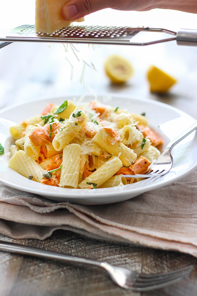 Get into summer full swing with this light lemon garlic pasta with salmon. Full of fresh, summer flavors!