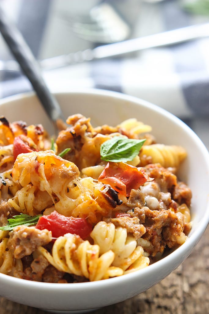 A cheesy hot Italian pasta bake with a spiced savory and sweet marinara sauce, hot Italian flavors and plenty of cheese.