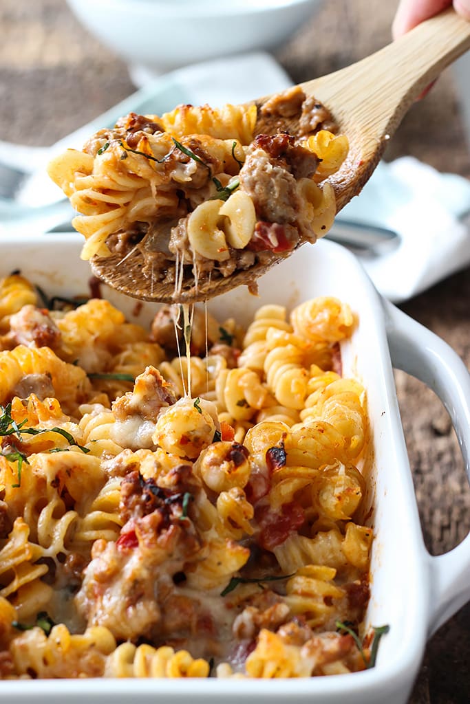 A cheesy hot Italian pasta bake with a spiced savory and sweet marinara sauce, hot Italian flavors and plenty of cheese.