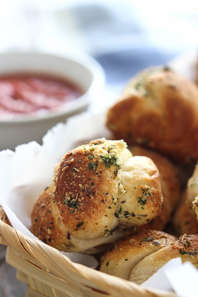 Love garlic knots? Make these easy Parmesan garlic knots at home with a simple cheat! Ready in under 30 minutes.