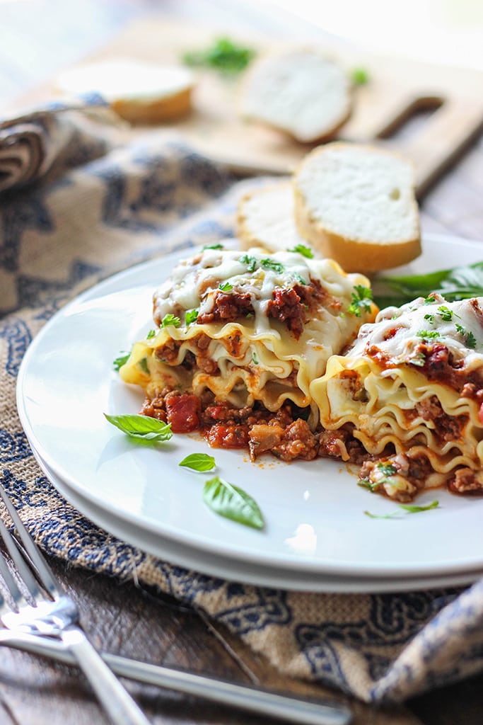 Make some individual sized meaty and cheesy lasagna roll ups. A fun twist on the classic with enough to serve a crowd. 