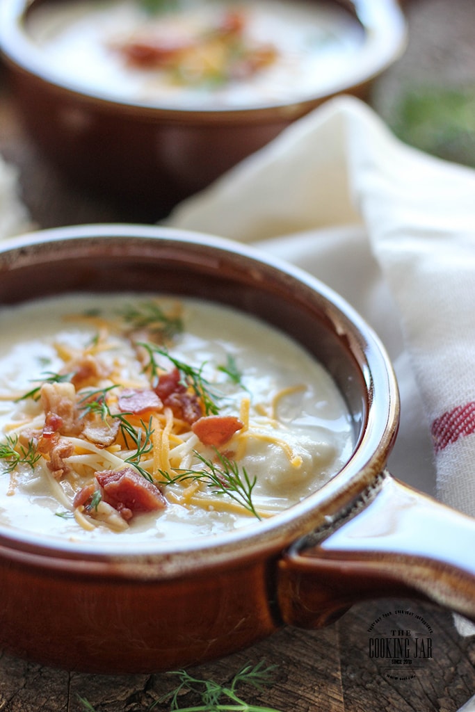 Slow cooker cream cheese and potato soup is hearty, creamy and perfect with bread. Slow cook your way to comfort food this winter.