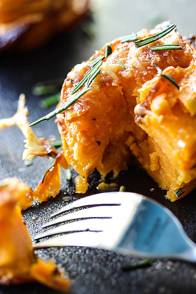 Do things differently with these garlic Parmesan sweet potato stacks. With crispy brown edges and soft tender centers, fresh rosemary, garlic, butter and Parmesan!