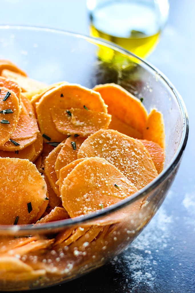 Do things differently with these garlic Parmesan sweet potato stacks. With crispy brown edges and soft tender centers, fresh rosemary, garlic, butter and Parmesan!