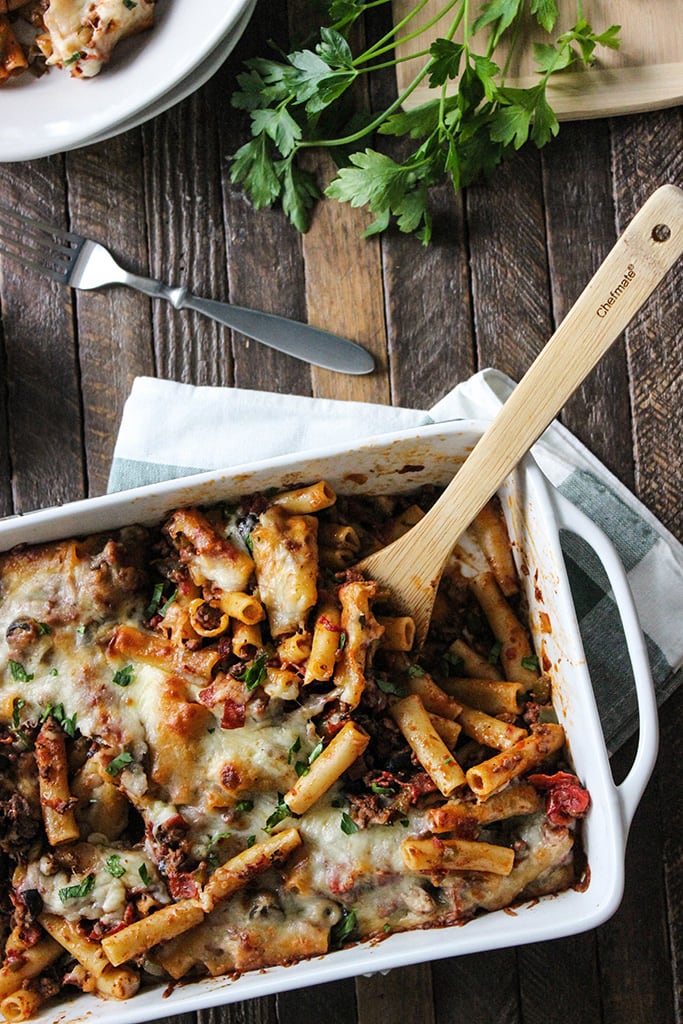 This pizza pasta casserole has all the flavors of pizza you love in casserole form. With tons of mozzarella cheese and lots of cheese strings!