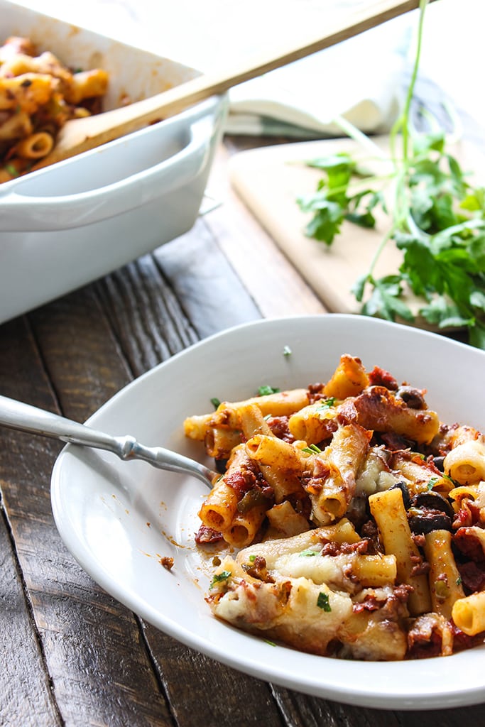 This pizza pasta casserole has all the flavors of pizza you love in casserole form. With tons of mozzarella cheese and lots of cheese strings!