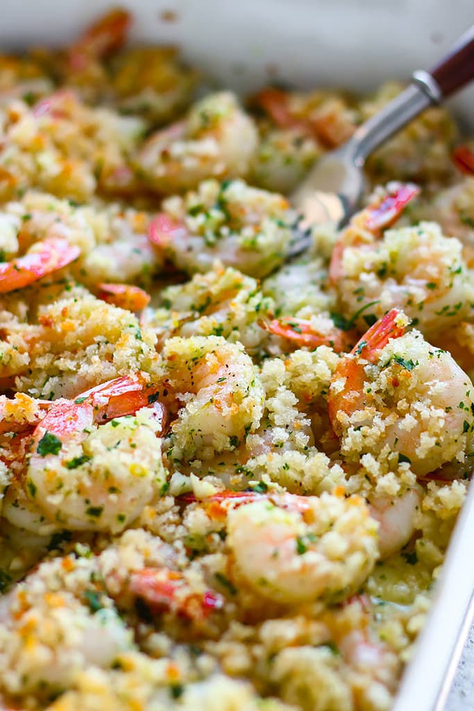 This lemon garlic butter baked shrimp is fresh, crunchy and full of zest. Ready in 20 minutes with easy to get store-bought ingredients!