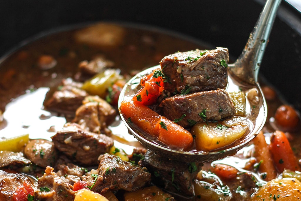 A hearty slow cooker beef stew with fall-apart, tender chuck roast, potatoes and carrots. A comforting, warm meal perfect for the cold weather.