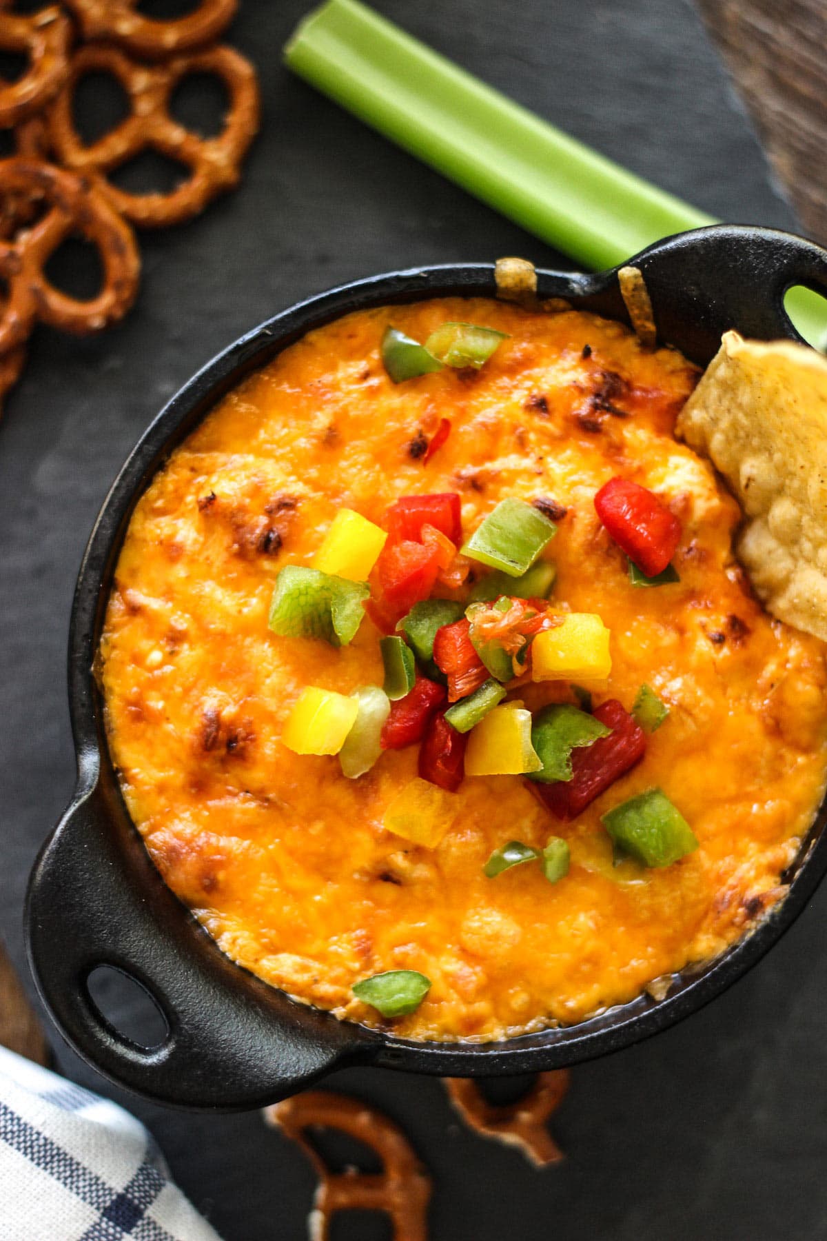 This tangy and creamy buffalo chicken dip is perfect for parties, cookouts or game day. Add some cheese to make it a bubbling dip!