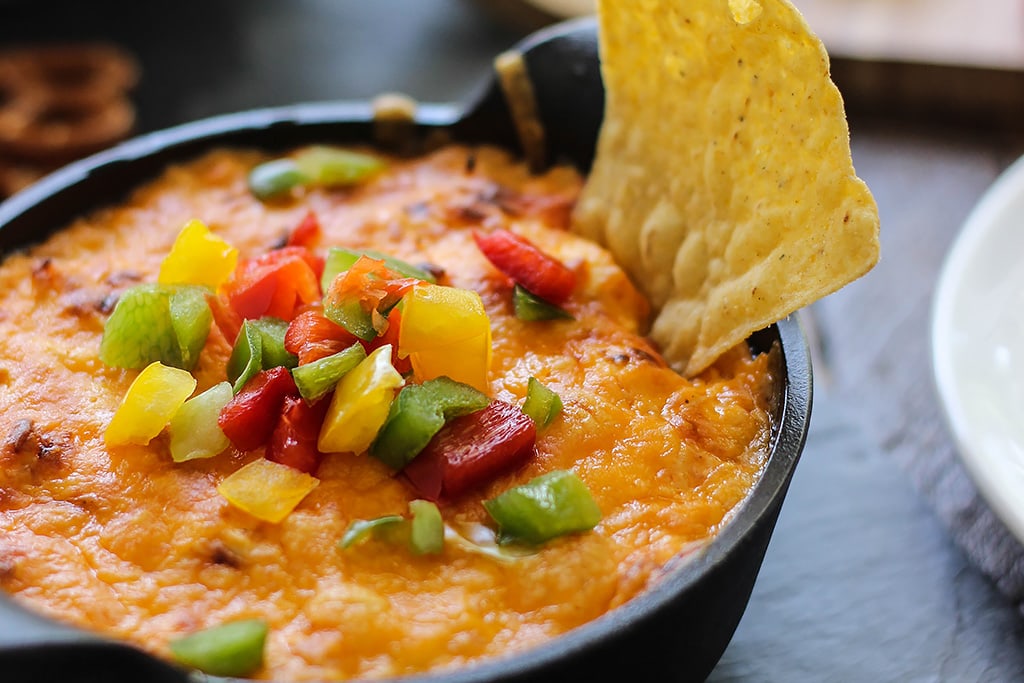 This tangy and creamy buffalo chicken dip is perfect for parties, cookouts or game day. Add some cheese to make it a bubbling dip!