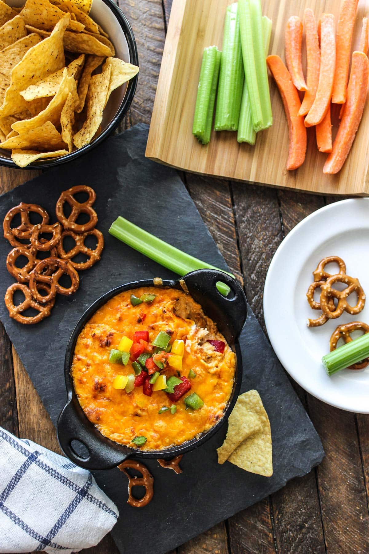 This tangy and creamy buffalo chicken dip is perfect for parties, cookouts or game day. Add some cheese to make it a bubbling dip!