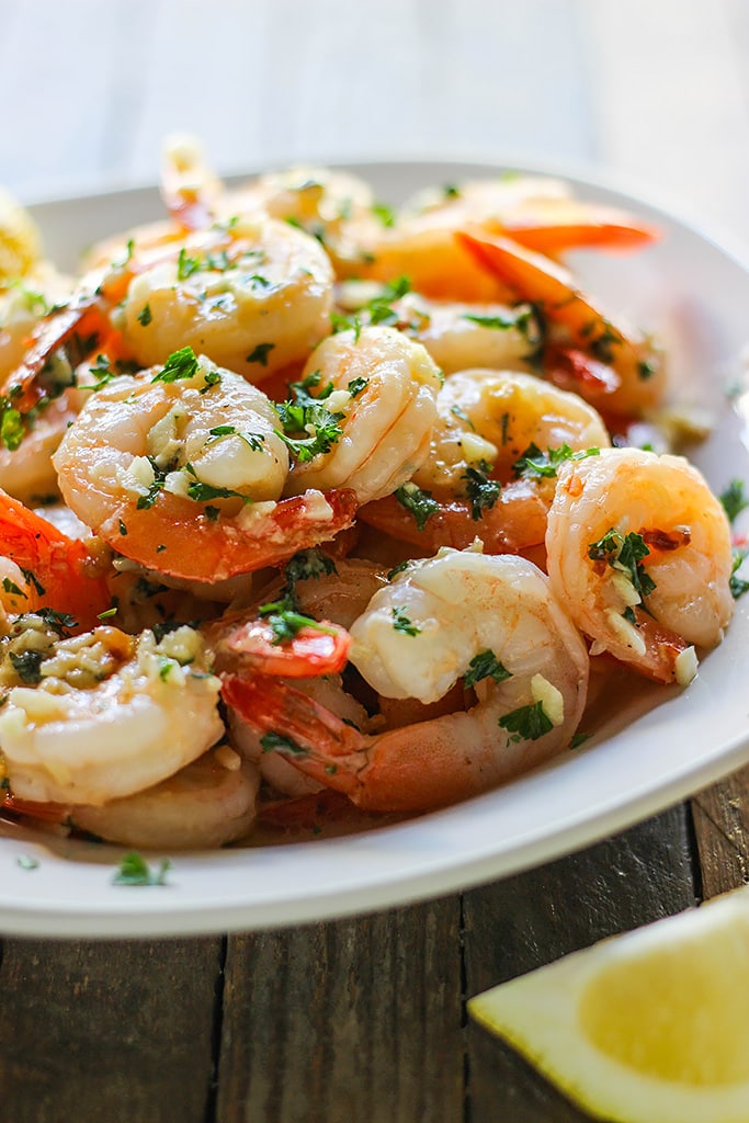 Enjoy a 20 minute meal with easy shrimp scampi; seared shrimp in a garlic buttery sauce with a hint of lemon, parsley and served over a bed of your favorite pasta.