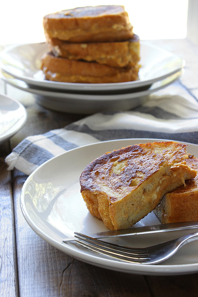 This pumpkin cream cheese french toast is a fun way to celebrate pumpkin season! With a cheesy pumpkin filling and all french toast flavors you love.