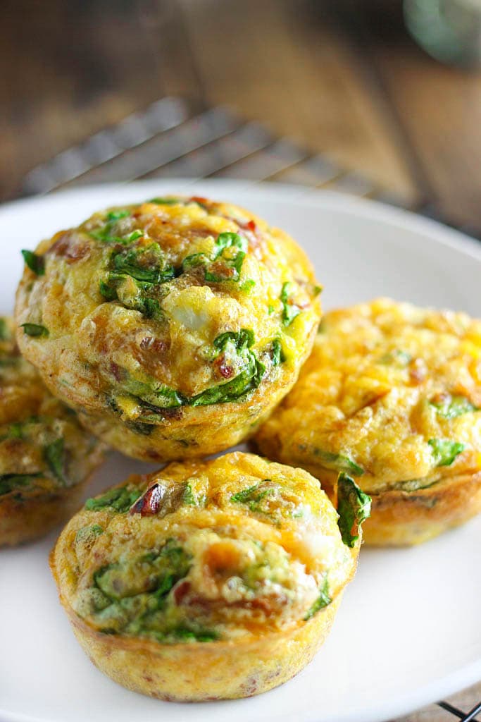 A quick and easy way to get your eggs to go. Loaded with bacon bits, cheddar cheese and spinach!