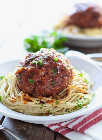 Mozzarella stuffed meatball pasta for two. At half a pound each, one meatball is all you need! Complete with a gooey cheesy center.